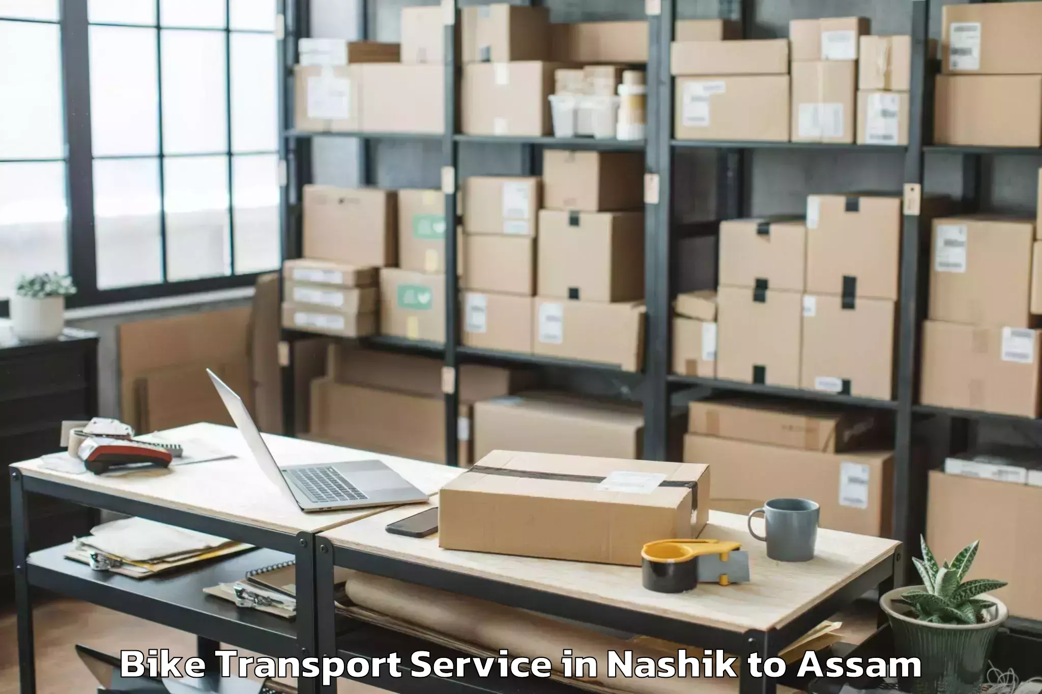 Book Nashik to Sualkuchi Bike Transport Online